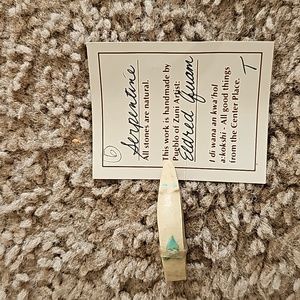 Zuni Serpentine  bear stone. with artist name on card